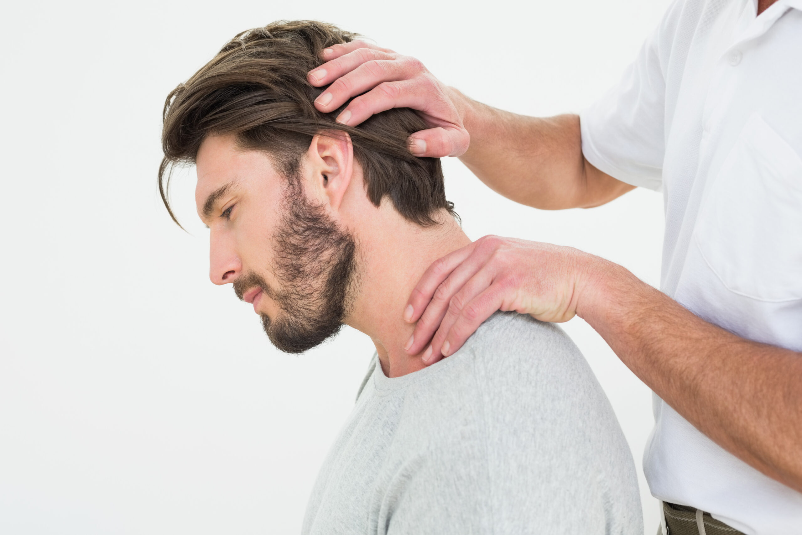 a chiropractor in San Diego, CA is treating a patient